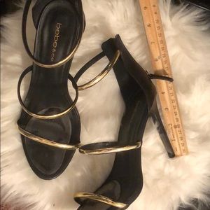 Bebe & Co. Black and gold heels